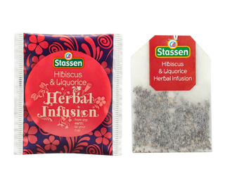 STASSEN Herbata - Hibiscus Tea - kartonik z herbatą ziołową - ozdobiony czerwonymi ornamentami.