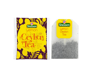 Stassen Lemon Tea w pudełku z żółtym zdobieniem – ekspresowa herbata cejlońska z cytryną.