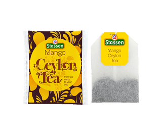 Stassen Mango Tea w pudełku z pomarańczowo-żółtym zdobieniem – ekspresowa herbata cejlońska z mango.
