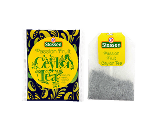 Stassen Passion Fruit w pudełku z żółtym zdobieniem – ekspresowa herbata cejlońska z marakują.