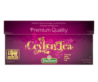 STASSEN Herbata - Premium Quality Ceylon Tea - ozdobne opakowanie ze złotym akcentem z czarną cejlońską herbatą.