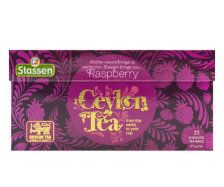 STASSEN Herbata - Raspberry Tea - ozdobne fioletowe opakowanie z motywem roślinnym.